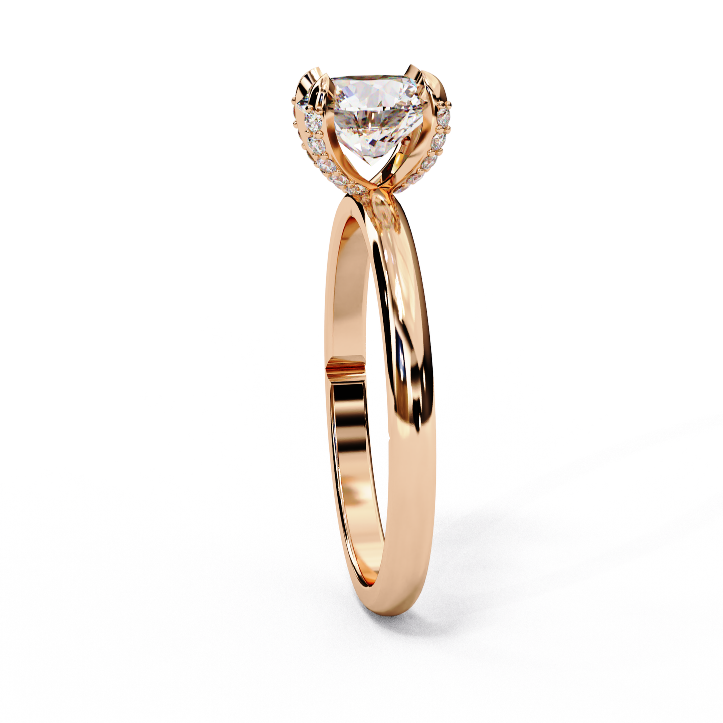 Rose gold round solitaire ring with four prongs and hidden pave basket #ROSE GOLD