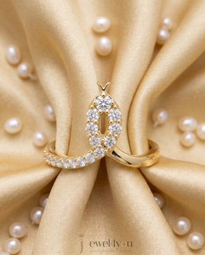 Lab-grown diamond ring front view with open elongated bypass silhouette and round diamonds, VVS to VS+ clarity, D–F color, Yellow Gold prong setting 