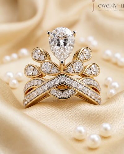 PEAR AND ROUND DIAMOND YELLOW GOLD RING 