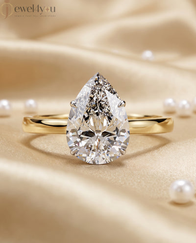 Yellow gold pear-cut solitaire engagement ring with white prong head #YELLOW GOLD