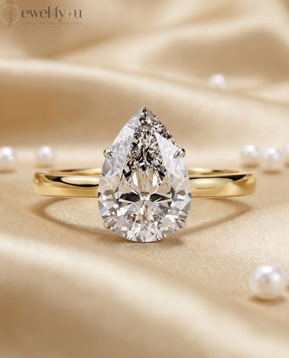 Yellow gold pear-cut solitaire engagement ring with white prong head #YELLOW GOLD
