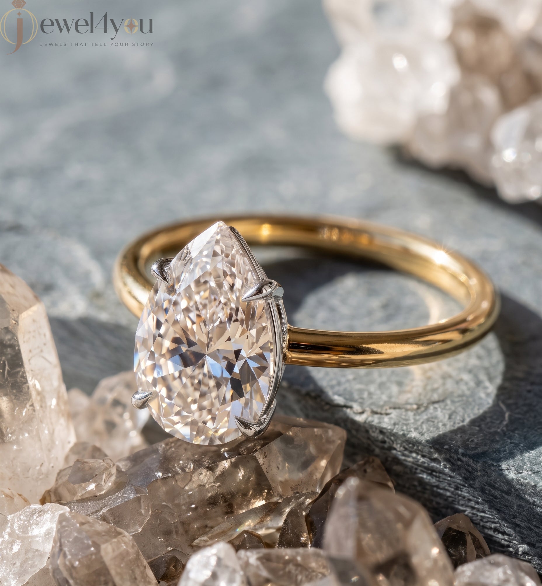 YELLOW GOLD PEAR-CUT LAB DIAMOND ENGAGEMENT RING WITH ELEVATED FOUR-PRONG SETTING 