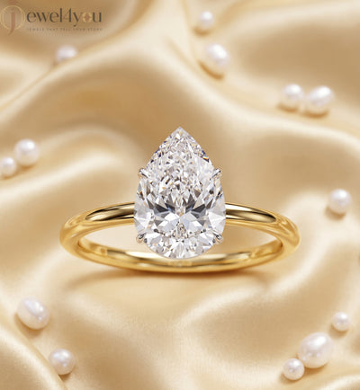 YELLOW GOLD PEAR-CUT LAB DIAMOND ENGAGEMENT RING WITH ELEVATED FOUR-PRONG SETTING 