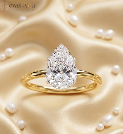 YELLOW GOLD PEAR-CUT LAB DIAMOND ENGAGEMENT RING WITH ELEVATED FOUR-PRONG SETTING 