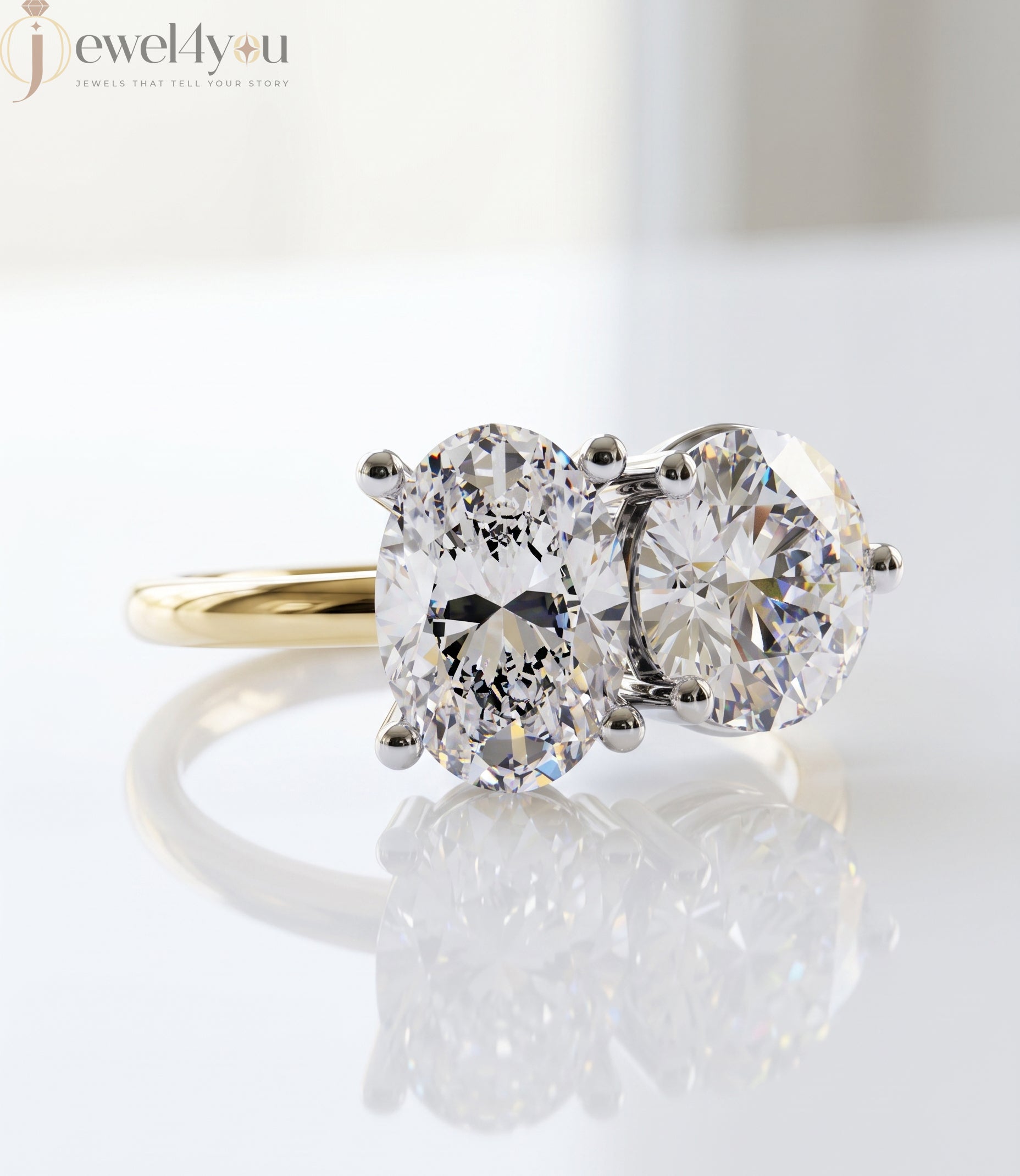 YELLOW GOLD DUAL DIAMOND ENGAGEMENT RING WITH ROUND AND OVAL CUT DIAMONDS 