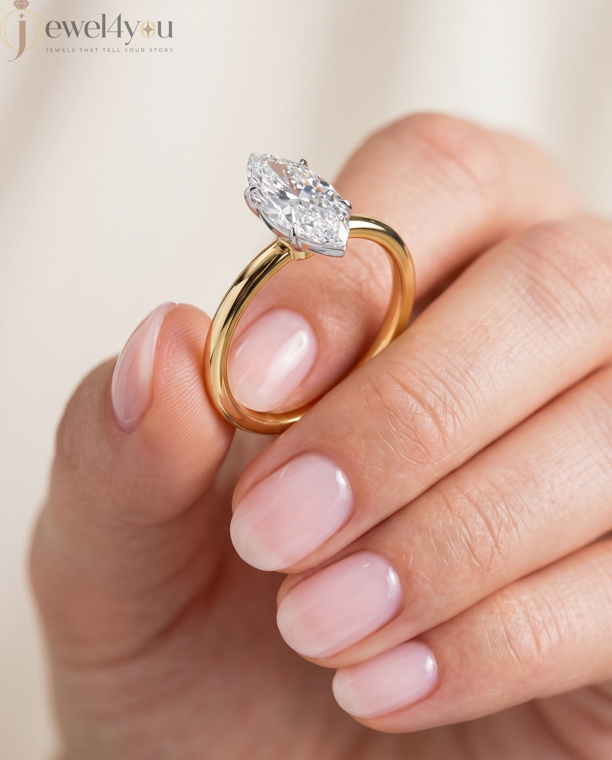 YELLOW GOLD MARQUISE -CUT LAB DIAMOND ENGAGEMENT RING WITH ELEVATED SIX-PRONG SETTING 