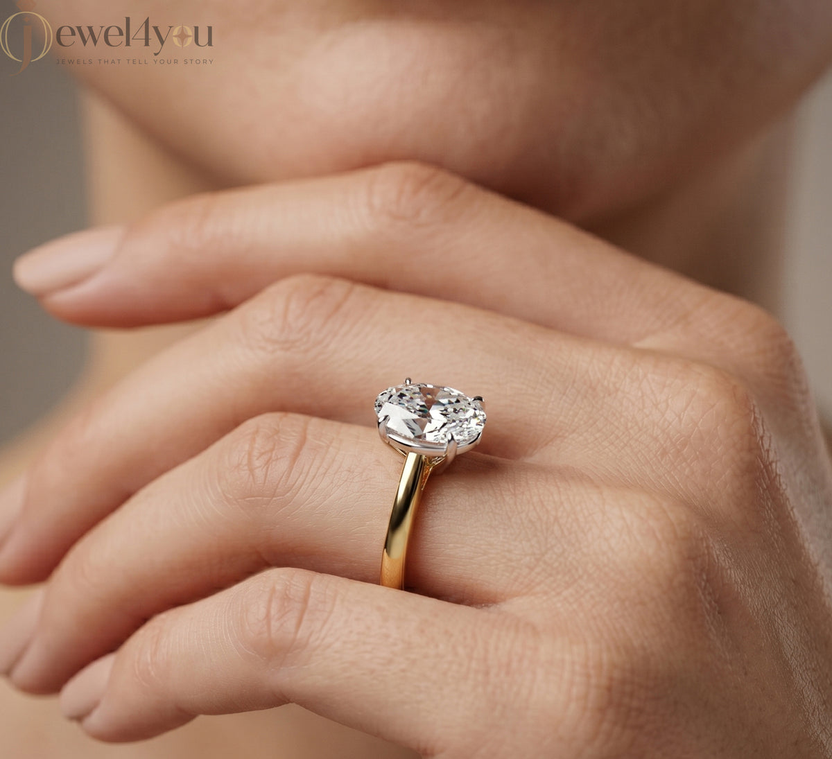 Yellow gold oval diamond solitaire engagement ring with white-gold prong setting #YELLOW GOLD