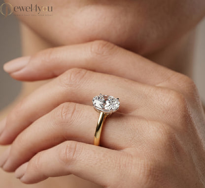 Yellow gold oval diamond solitaire engagement ring with white-gold prong setting #YELLOW GOLD