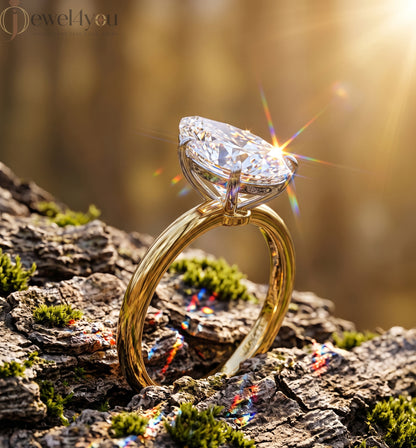 YELLOW GOLD PEAR-CUT LAB DIAMOND ENGAGEMENT RING WITH ELEVATED FOUR-PRONG SETTING 