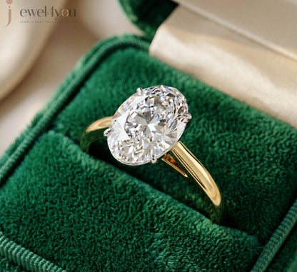 Yellow gold oval diamond solitaire engagement ring with white-gold prong setting #YELLOW GOLD