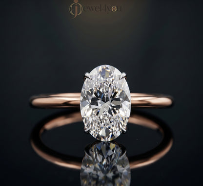 AURIQUE SOLITAIRE RING WITH OVAL-CUT LAB-GROWN DIAMOND IN ROSE GOLD 