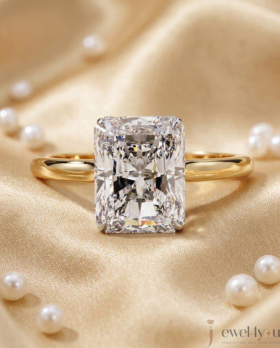 YELLOW GOLD SOLITAIRE ENGAGEMENT RING FEATURING A RADIANT LAB DIAMOND 