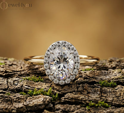YELLOW GOLD WITH OVAL CENTER AND ROUND HALO 