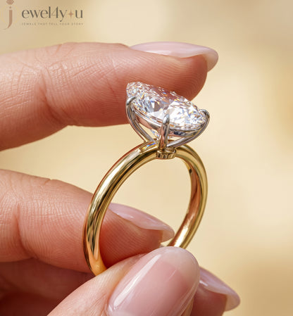 YELLOW GOLD PEAR-CUT LAB DIAMOND ENGAGEMENT RING WITH ELEVATED FOUR-PRONG SETTING 