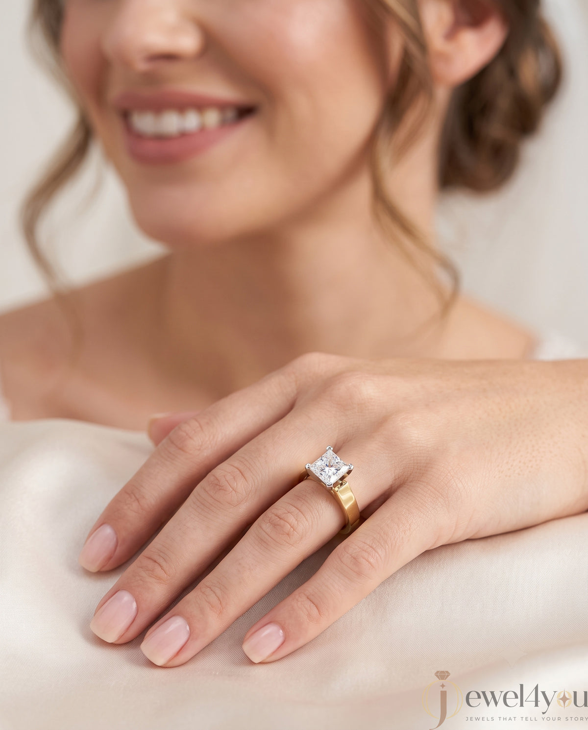 Yellow gold princess-cut solitaire ring with quad corner prongs 