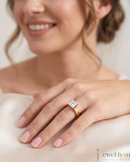 Yellow gold princess-cut solitaire ring with quad corner prongs 