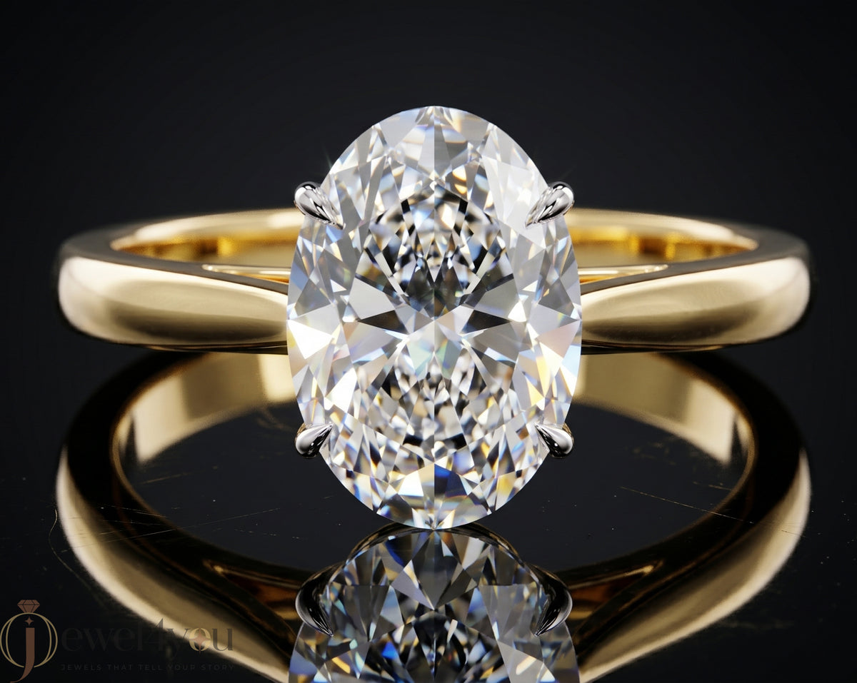 Yellow gold oval diamond solitaire engagement ring with white-gold prong setting #YELLOW GOLD