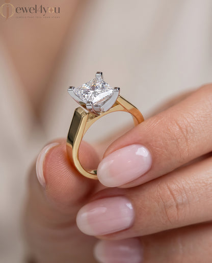 Yellow gold princess-cut solitaire ring with quad corner prongs 