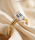 Emerald Step-Cut Cathedral Solitaire Ring