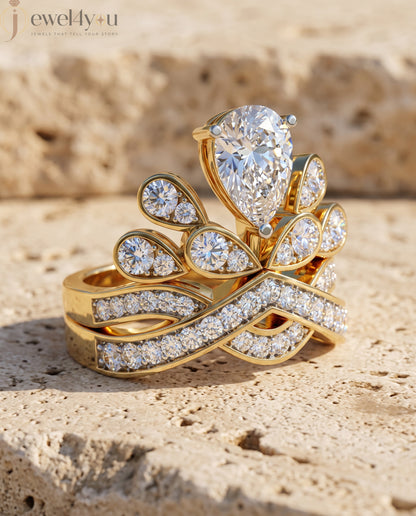 PEAR AND ROUND DIAMOND YELLOW GOLD RING 