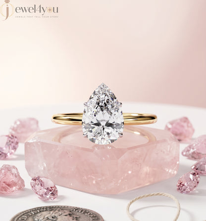 YELLOW GOLD PEAR-CUT LAB DIAMOND ENGAGEMENT RING WITH ELEVATED FOUR-PRONG SETTING 