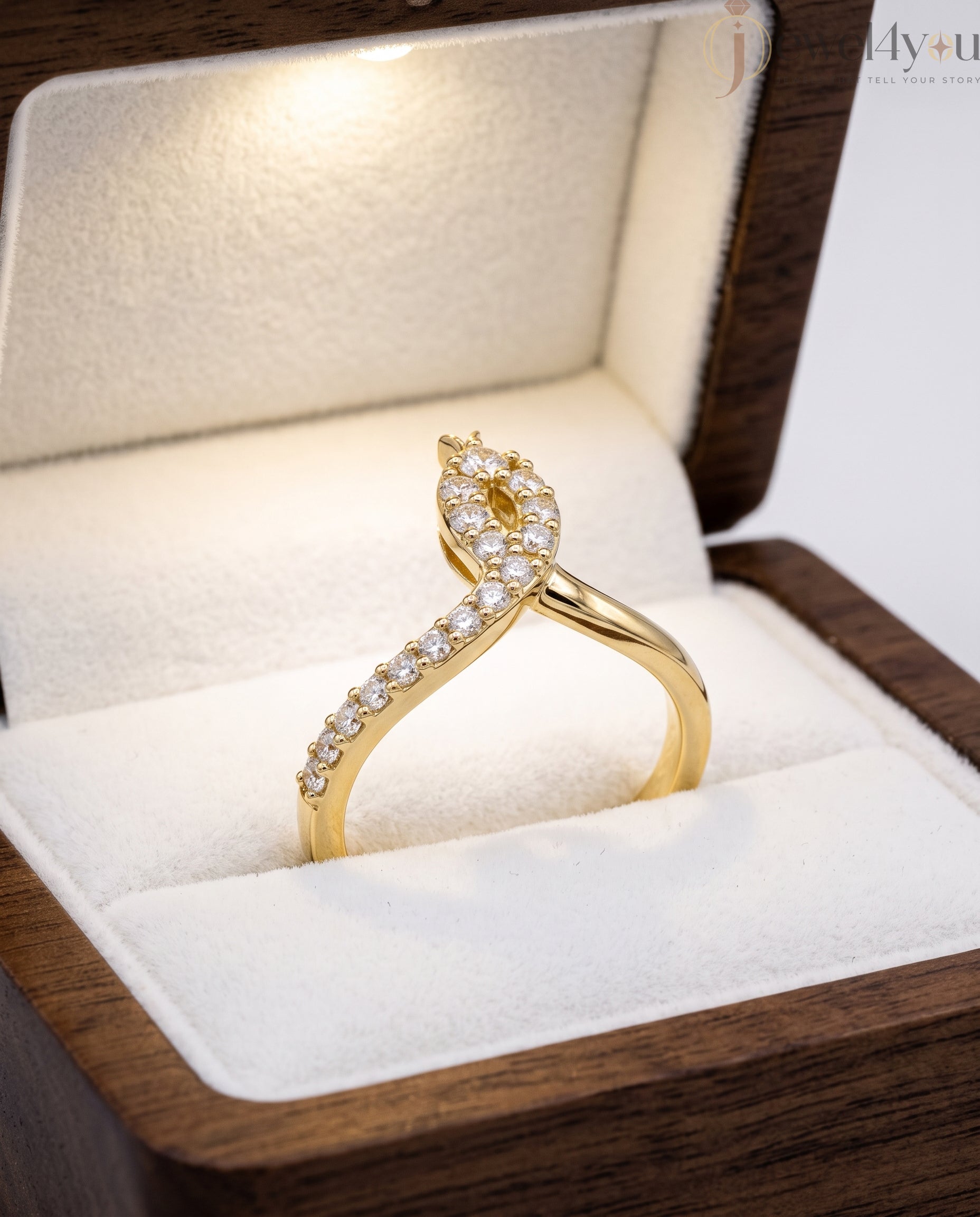 Lab-grown diamond ring front view with open elongated bypass silhouette and round diamonds, VVS to VS+ clarity, D–F color, Yellow Gold prong setting 
