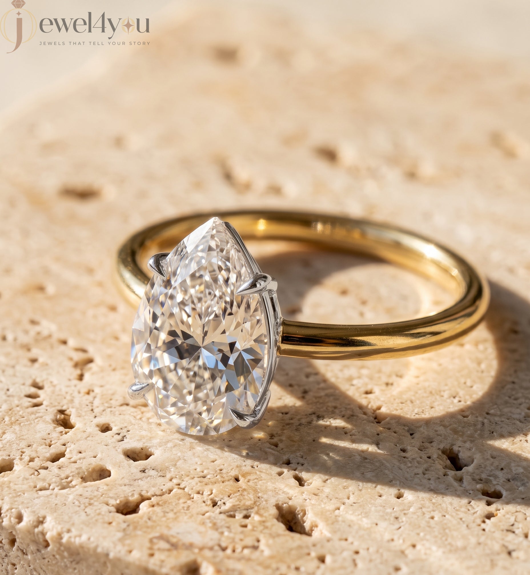 YELLOW GOLD PEAR-CUT LAB DIAMOND ENGAGEMENT RING WITH ELEVATED FOUR-PRONG SETTING 