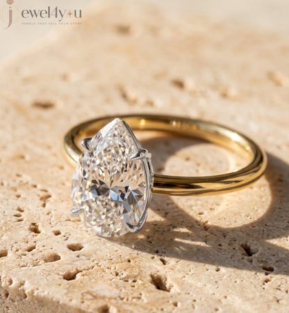 YELLOW GOLD PEAR-CUT LAB DIAMOND ENGAGEMENT RING WITH ELEVATED FOUR-PRONG SETTING 