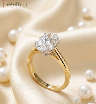 Yellow gold oval diamond solitaire engagement ring with white-gold prong setting #YELLOW GOLD