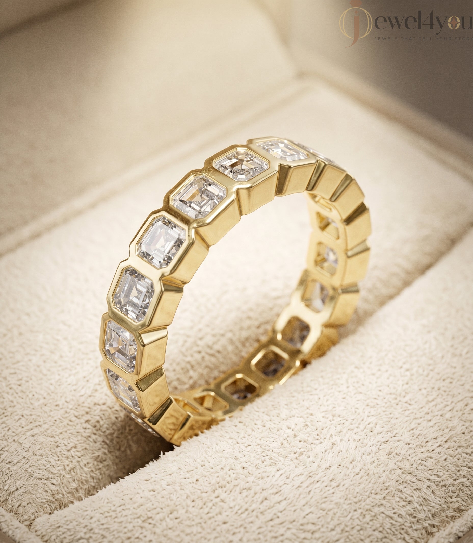 Yellow gold emerald-cut lab-grown diamond eternity band featuring bezel-set VVS to VS+ clarity D–F color diamonds around entire ring #YELLOW GOLD