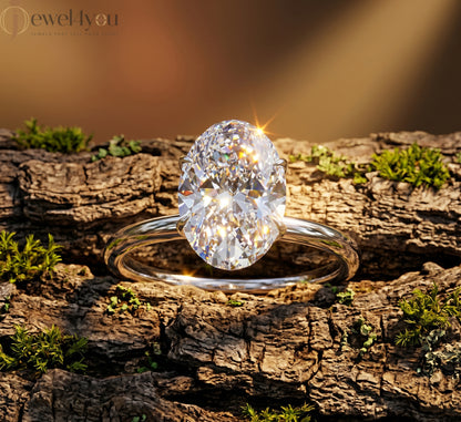 AURIQUE SOLITAIRE RING WITH OVAL-CUT LAB-GROWN DIAMOND IN WHITE GOLD 