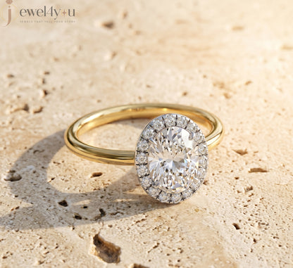 YELLOW GOLD WITH OVAL CENTER AND ROUND HALO 