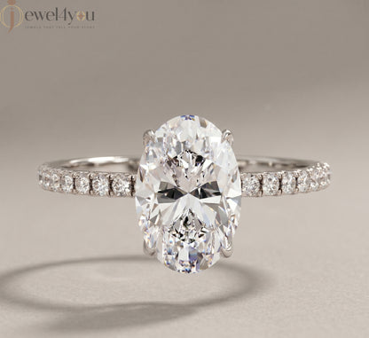 OVAL-CUT SOLITAIRE LAB-GROWN DIAMOND RING IN WHITE GOLD WITH ROUND-CUT 