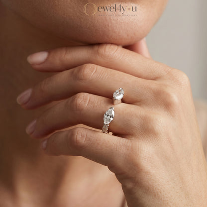 MARQUISE AND ROUND DIAMOND YELLOW GOLD RING 
