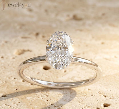 AURIQUE SOLITAIRE RING WITH OVAL-CUT LAB-GROWN DIAMOND IN WHITE GOLD 