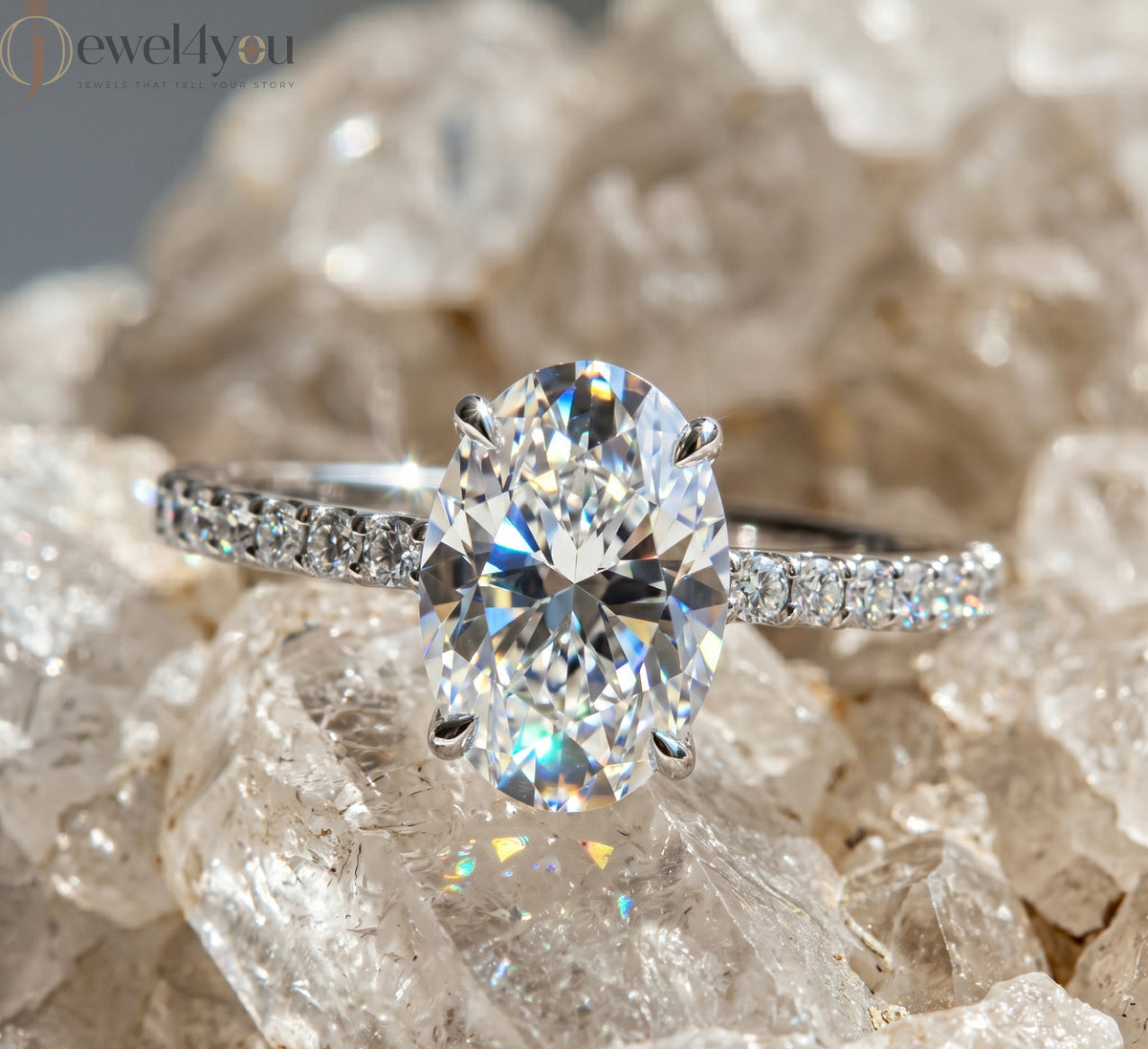 OVAL-CUT SOLITAIRE LAB-GROWN DIAMOND RING IN WHITE GOLD WITH ROUND-CUT 