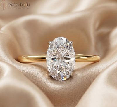 AURIQUE SOLITAIRE RING WITH OVAL-CUT LAB-GROWN DIAMOND IN YELLOW GOLD 