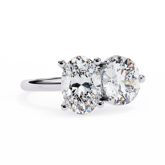 WHITE GOLD DUAL DIAMOND ENGAGEMENT RING WITH ROUND AND OVAL CUT DIAMONDS 
