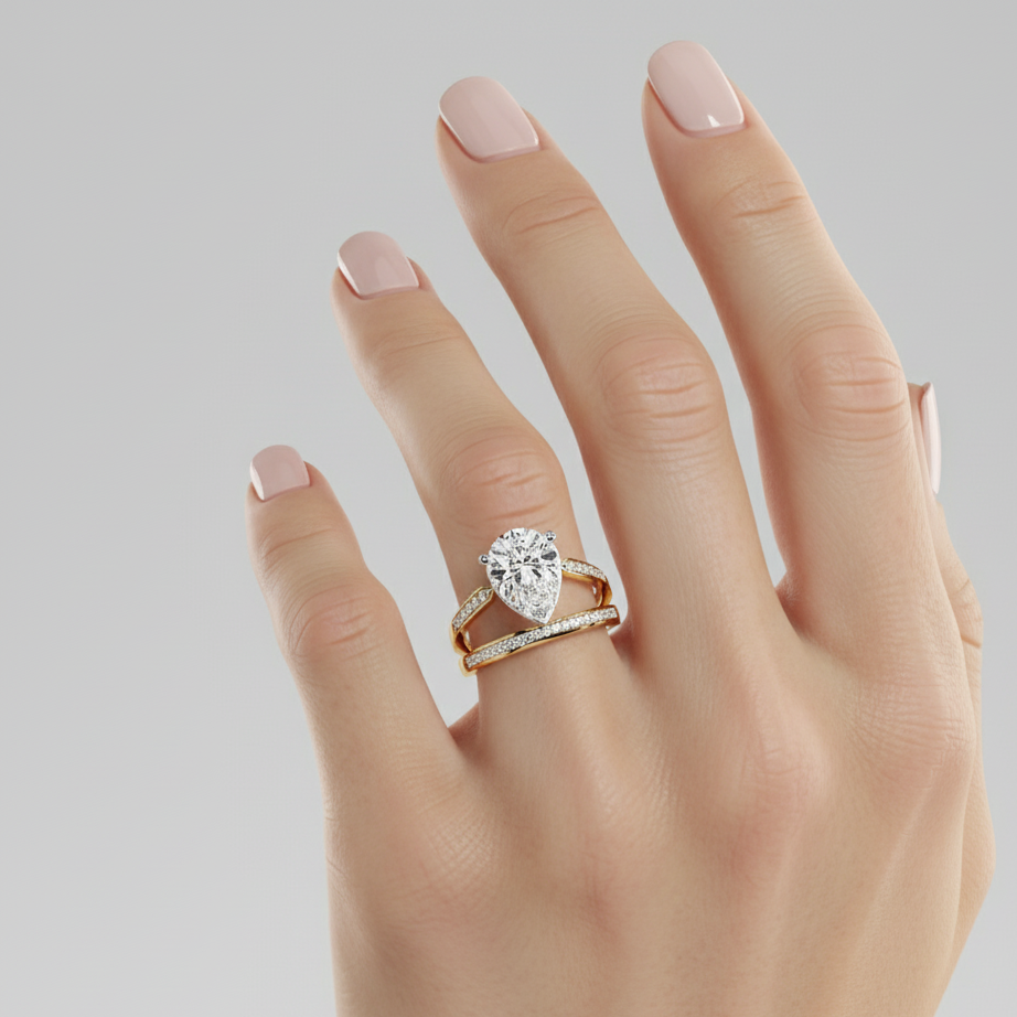 PEAR DIAMOND YELLOW GOLD SOLITAIRE RING 