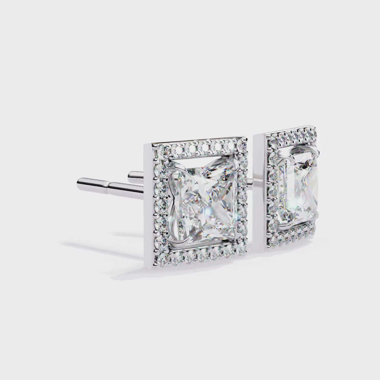 PRINCESS AND ROUND DIAMOND WHITE GOLD SOLITAIRE HALO STUD ##WHITE GOLD